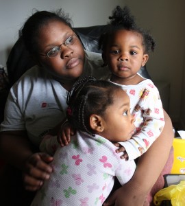 Bianca Lewis, at her Sun Prairie, Wis. apartment, Saturday, October 17, 2009 holding son Javeen Wilson, 15 months, right, and daughter Anija Wilson, 2 years.