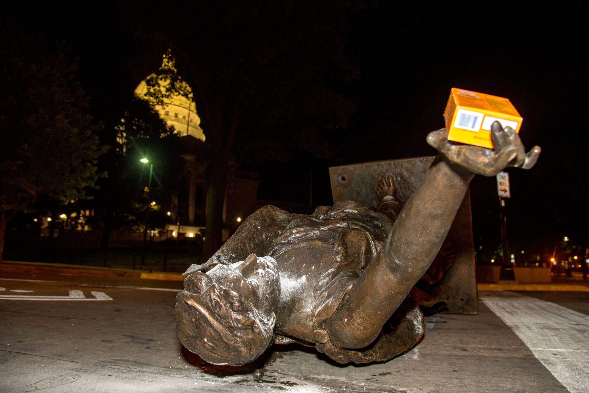 Protesters tear down statues near state Capitol; state senator physically attacked