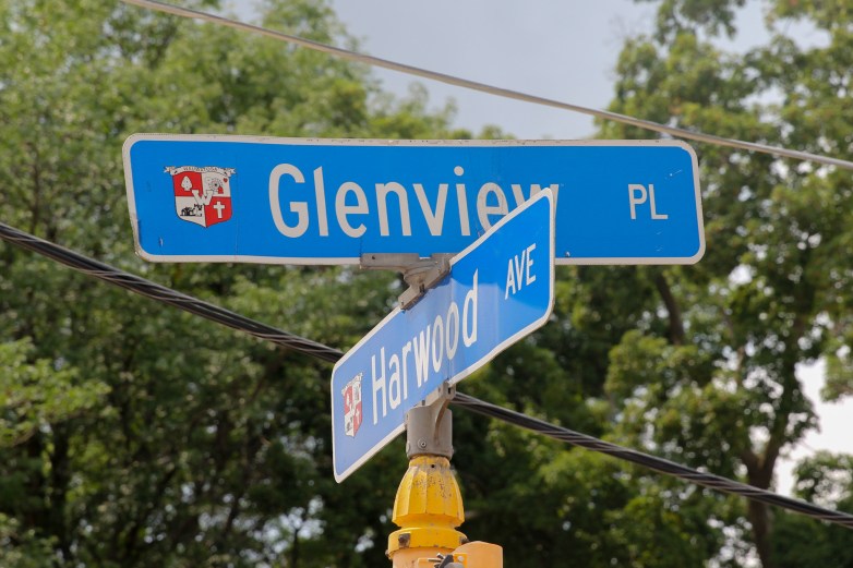 Blue signs show the intersection of 
