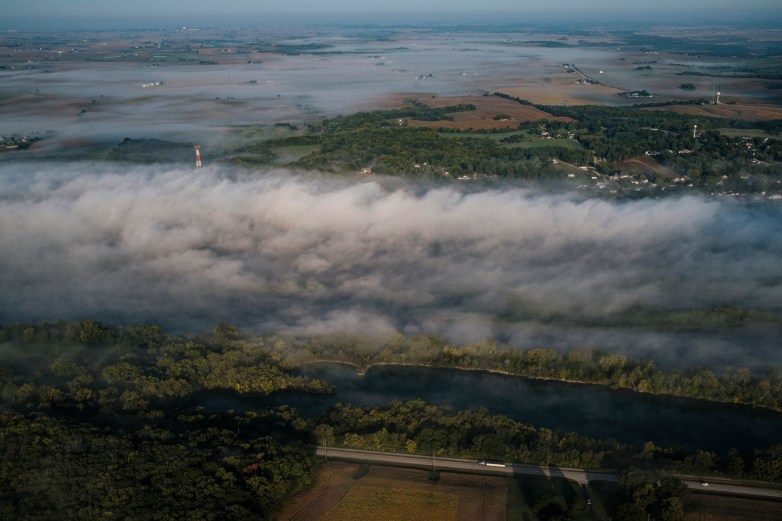 Aerial view shows fog and the Mississippi River.