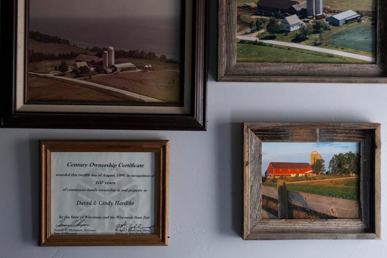 Framed farm photos and